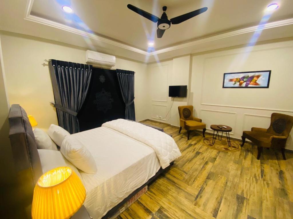 Holidazzle Serviced Apartments Bahria Town Rawalpindi Buitenkant foto